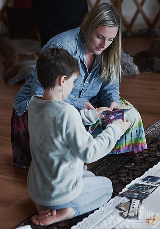 A mother and daughter select angel cards  at a mother and daughter workshop by Vancouver workshop and retreat photographer Angela McConnell