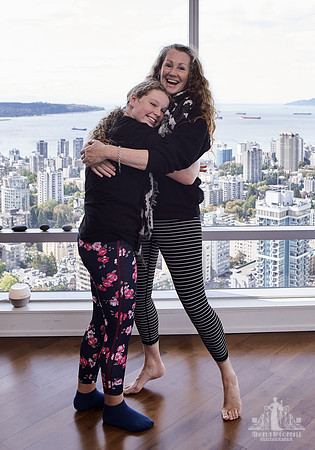 A mother and daughter hug during portraits at a Wildflower mother and daughter workshop by Vancouver workshop and retreat photographer Angela McConnell