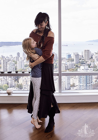 A mother and daughter hug during portraits at a Wildflower mother and daughter workshop by Vancouver workshop and retreat photographer Angela McConnell