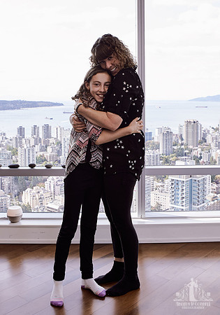 A mother and daughter hug during portraits at a Wildflower mother and daughter workshop by Vancouver workshop and retreat photographer Angela McConnell