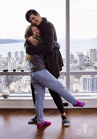 A mother and daughter hug during portraits at a Wildflower mother and daughter workshop by Vancouver workshop and retreat photographer Angela McConnell