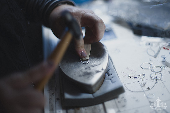 Personal branding image of a jeweller working on a piece of jewellery
